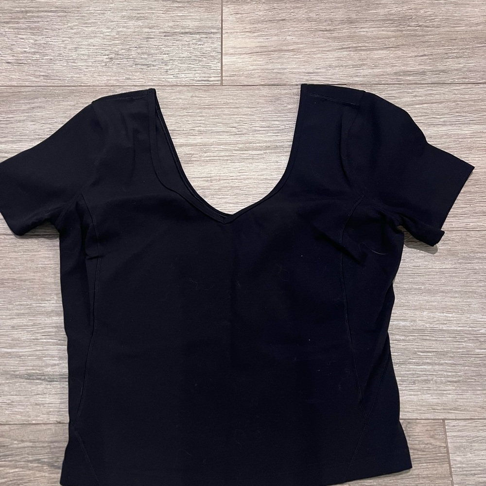 Black womens Lululemon crop top. Black. Great condition. Size 6